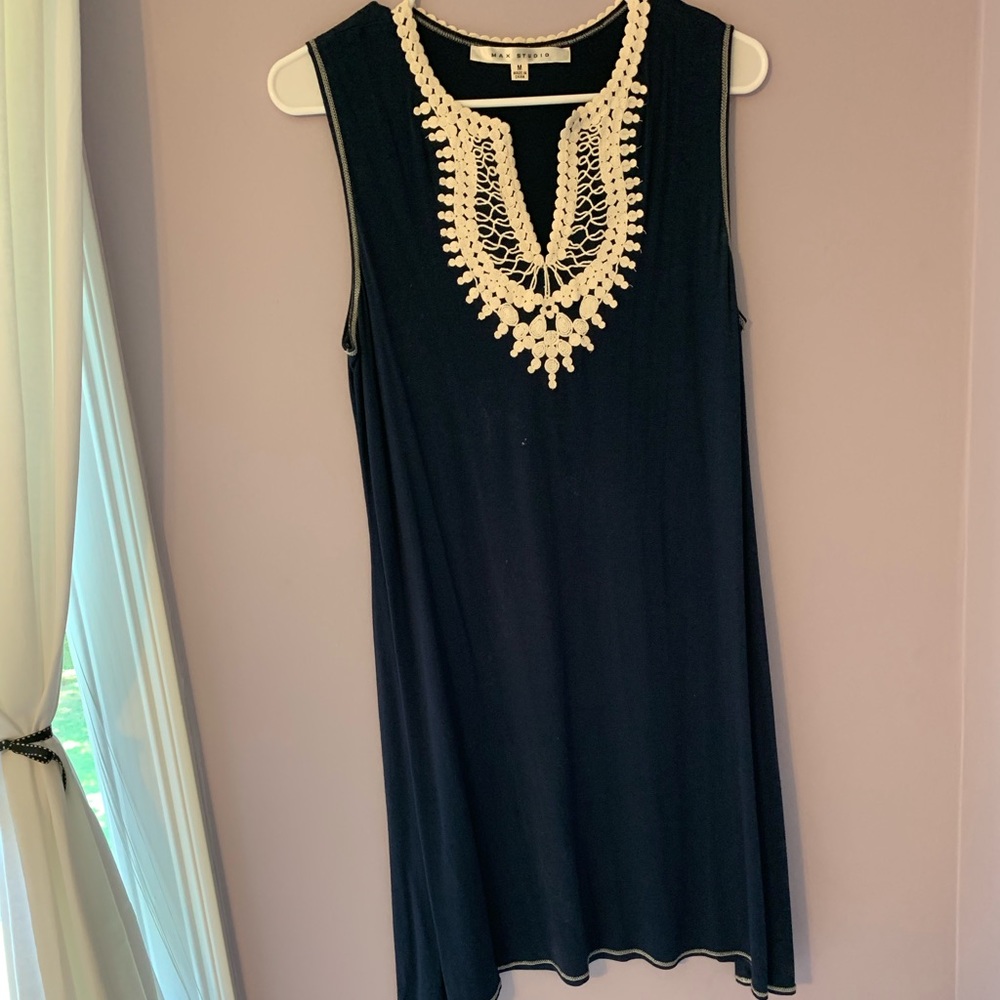 navy dress with white details.